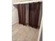 The closet features tile flooring and dark, heavy drapes at 4232 W Citrus Way, Phoenix, AZ 85019