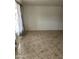 Bright living room with tile floors and a large window for natural light at 4232 W Citrus Way, Phoenix, AZ 85019