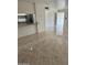 Open-concept living space with tile flooring and lots of natural light at 4232 W Citrus Way, Phoenix, AZ 85019