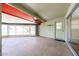 Spacious sunroom with natural light and stone flooring at 10501 W Willow Creek Cir, Sun City, AZ 85373