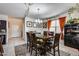 Bright dining room featuring a spacious table with six chairs at 30423 W Catalina Dr, Buckeye, AZ 85396