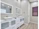 Modern bathroom with double vanity and updated fixtures at 916 E Beautiful Ln, Phoenix, AZ 85042