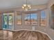 Breakfast nook with bay window and sliding glass door access to patio at 916 E Beautiful Ln, Phoenix, AZ 85042