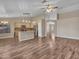 Modern kitchen with island, stainless steel appliances, and granite countertops at 916 E Beautiful Ln, Phoenix, AZ 85042