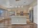 Kitchen boasts granite countertops and stainless steel appliances at 916 E Beautiful Ln, Phoenix, AZ 85042