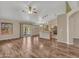Open living space with kitchen views and wood-look floors at 916 E Beautiful Ln, Phoenix, AZ 85042