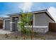 Charming home with stone accents, low maintenance landscaping, and neutral colors at 18605 E Panchito Dr, Gold Canyon, AZ 85118