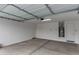 Spacious garage with updated fixtures and door to inside at 18605 E Panchito Dr, Gold Canyon, AZ 85118