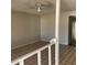 Inviting living room featuring tile flooring and a ceiling fan at 4147 W Reade Ave, Phoenix, AZ 85019