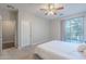 Bedroom with queen bed and access to a walk-in closet at 1406 W Main St # 120, Mesa, AZ 85201