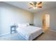 Spacious bedroom with a queen-size bed and ensuite access at 1406 W Main St # 120, Mesa, AZ 85201