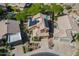 Aerial view of a beautiful home showcasing desert landscaping, a tile roof, and solar panels at 1416 E Sapium Way, Phoenix, AZ 85048