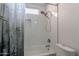 Bathroom featuring subway tile surround, shower/tub combo, and nature-themed shower curtain at 1416 E Sapium Way, Phoenix, AZ 85048