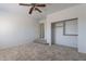 Neutral bedroom with closet and doorway at 1416 E Sapium Way, Phoenix, AZ 85048