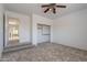 Bedroom with doorway leading to another room and closet at 1416 E Sapium Way, Phoenix, AZ 85048