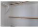 Walk-in closet with white shelving and neutral carpet at 1416 E Sapium Way, Phoenix, AZ 85048