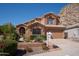 Charming two-story home featuring low maintenance desert landscaping at 1416 E Sapium Way, Phoenix, AZ 85048