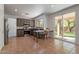Modern kitchen features stainless steel appliances and a sliding glass door to backyard at 1416 E Sapium Way, Phoenix, AZ 85048