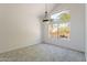 Bright living room boasts large windows providing natural light and outside views at 1416 E Sapium Way, Phoenix, AZ 85048