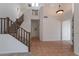 Open concept living room featuring a staircase at 1416 E Sapium Way, Phoenix, AZ 85048