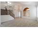 Open living area with vaulted ceiling and arched window at 1416 E Sapium Way, Phoenix, AZ 85048