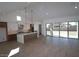 Open-concept living space with a kitchen, dining and living area at 21601 W Mariposa St, Buckeye, AZ 85396