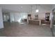 Expansive living space features wood floors and recessed lighting at 21601 W Mariposa St, Buckeye, AZ 85396