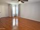 Main bedroom with hardwood floors and large windows at 8953 E Yucca St, Scottsdale, AZ 85260