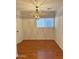 Bedroom with hardwood floors and a chandelier at 8953 E Yucca St, Scottsdale, AZ 85260