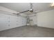 Spacious garage with new water heater and door to the interior of the house at 32030 N 20Th Ln, Phoenix, AZ 85085