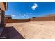 A expansive backyard with block wall, perfect for creating an outdoor oasis or entertaining guests at 18714 E Panchito Dr, Gold Canyon, AZ 85118