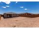 Large backyard featuring a block wall, providing privacy and plenty of space for outdoor activities at 18714 E Panchito Dr, Gold Canyon, AZ 85118