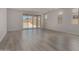 Bright and spacious living room with modern flooring and large windows for ample natural light at 18714 E Panchito Dr, Gold Canyon, AZ 85118