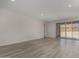 Open living space with modern floors, sliding glass doors, and lots of natural light at 18714 E Panchito Dr, Gold Canyon, AZ 85118