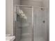 Beautifully tiled shower with glass door and modern fixtures at 18714 E Panchito Dr, Gold Canyon, AZ 85118