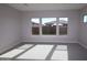 Well-lit room with large windows offering natural light and outside views at 1021 W Ridge Rd, Apache Junction, AZ 85120