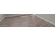 Close-up of elegant tile flooring with white trim and baseboards throughout the home at 1021 W Ridge Rd, Apache Junction, AZ 85120