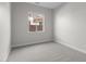Simple bedroom with soft carpet and ample natural light from the window at 1042 W Ridge Rd, Apache Junction, AZ 85120