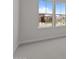 Bright bedroom with soft carpet and a window overlooking the yard at 1042 W Ridge Rd, Apache Junction, AZ 85120