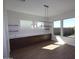 Bright dining room with built in cabinets and drawers and lots of natural light at 1042 W Ridge Rd, Apache Junction, AZ 85120