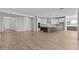 Open-concept living room featuring tile floors connecting seamlessly to the kitchen at 1042 W Ridge Rd, Apache Junction, AZ 85120