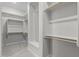 Large walk-in closet featuring custom shelving and ample storage space at 1042 W Ridge Rd, Apache Junction, AZ 85120