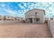 Large backyard of new construction home with block wall at 18336 W Daley Ln, Surprise, AZ 85387