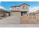 Two-story house with gray siding, blue shutters, and a two-car garage at 18336 W Daley Ln, Surprise, AZ 85387