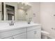 Bright bathroom with dual sinks, white cabinets, and modern fixtures at 18762 E Panchito Dr, Gold Canyon, AZ 85118
