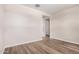 This bedroom has wood-look flooring and neutral tones at 18762 E Panchito Dr, Gold Canyon, AZ 85118