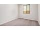 This bedroom offers neutral tones, natural light, and carpet floors at 18762 E Panchito Dr, Gold Canyon, AZ 85118