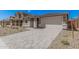 Two-story home with a paved driveway and desert landscape at 18762 E Panchito Dr, Gold Canyon, AZ 85118