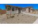 Single story home with a well-maintained desert landscape at 18762 E Panchito Dr, Gold Canyon, AZ 85118