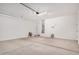 Spacious two car garage with concrete flooring at 18762 E Panchito Dr, Gold Canyon, AZ 85118